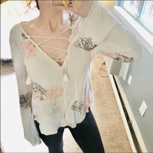 Love stitch floral cram lace up bell sleeve top